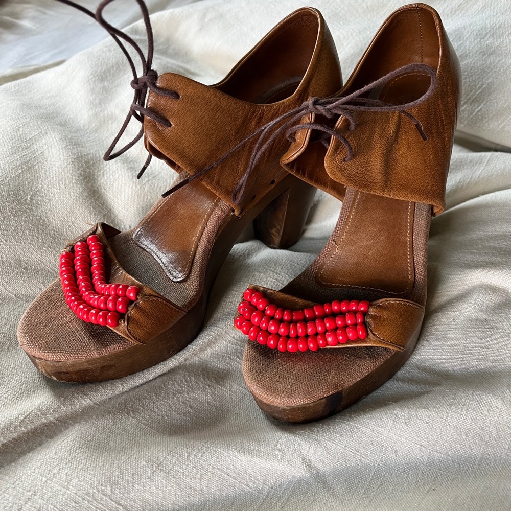 Rachel Comey wood clog heel with lace up and beads.